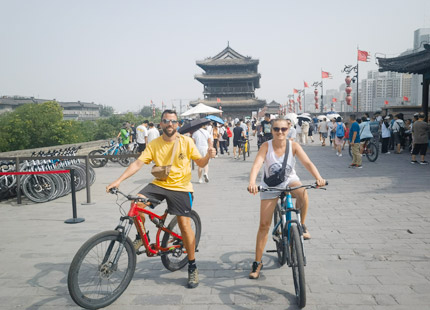 Customer biking on City Wall